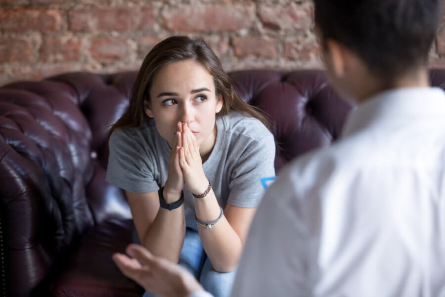 Young woman in an acceptance and commitment therapy session