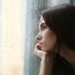Young depressed woman; grieving can cause mental illnesss