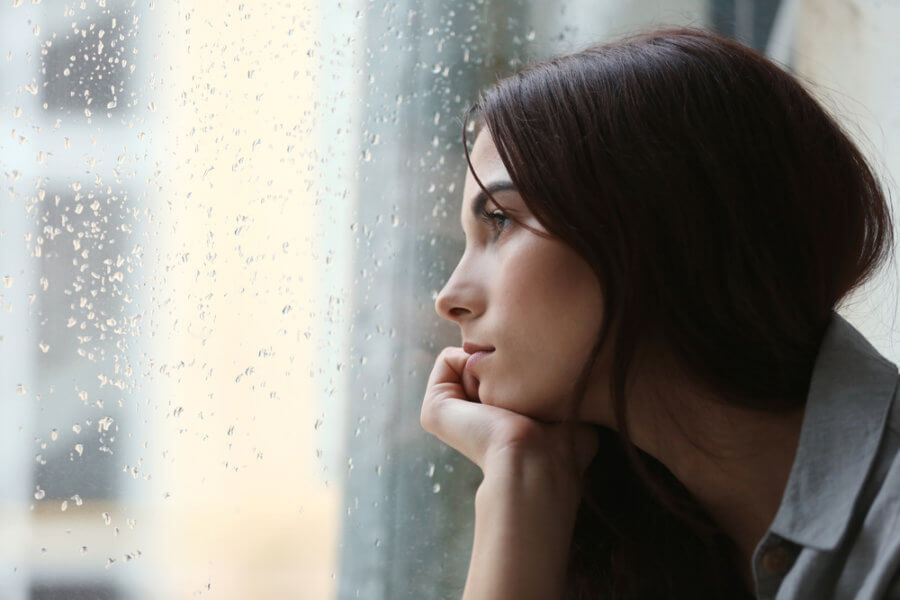 Young depressed mentally ill woman in grief