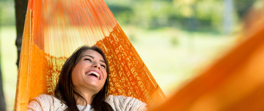 Content woman in hammock feeling better after MeRT Treatment