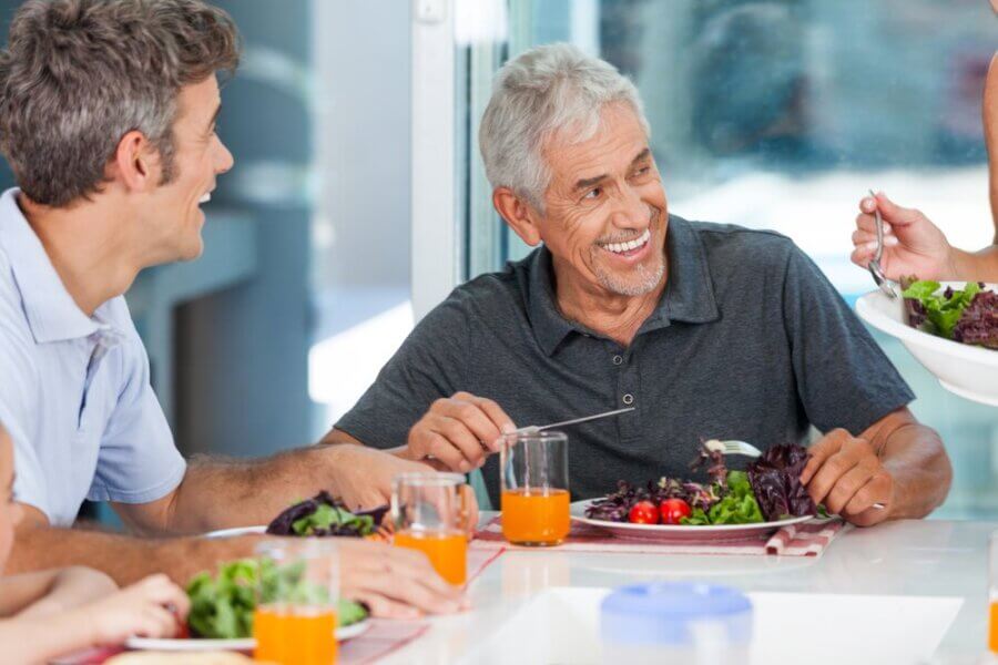 Senior man eating nutritious food