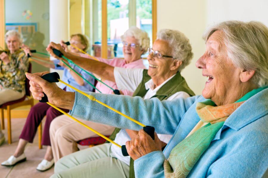 Seniors at Turnagain Social Club in Anchorage use exercise bands.