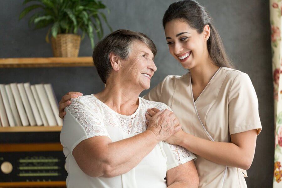 Turnagain Social Club Caregiver with patient